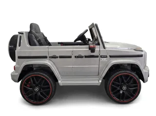 Voiture électrique enfant Mercedes G63 AMG gris métallisé 12V, habitacle simili cuir, pneus tout-terrain, pour enfant de 3-6 ans