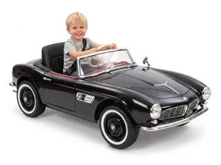BMW 507 enfant, Noir, enfant blond souriant au volant